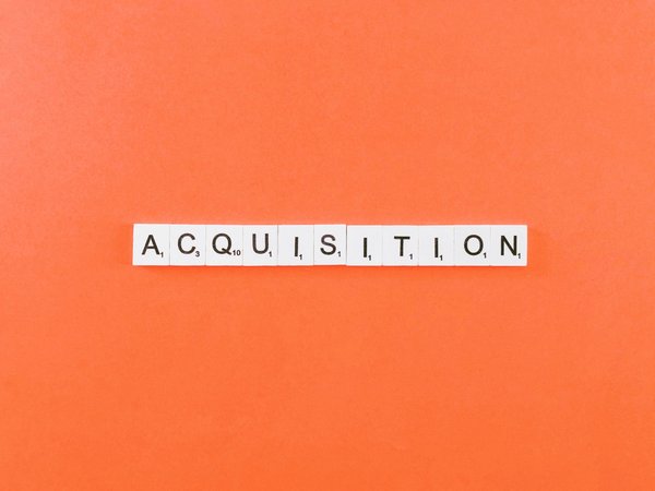 What are the steps for acquiring a property development loan for a UK inner-city regeneration project?